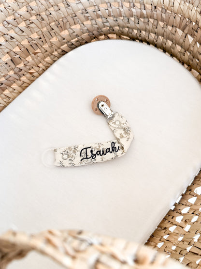 Attache-tétine personnalisable fleuri