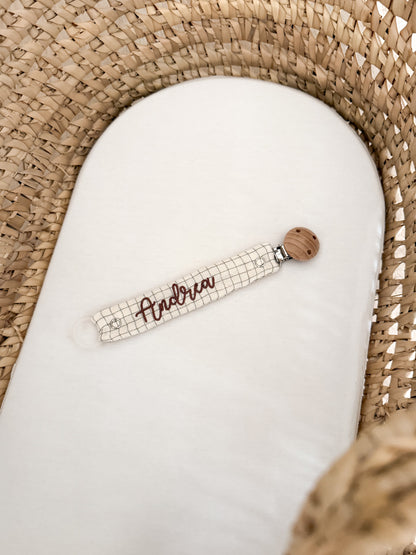 Attache-tétine CARREAUX